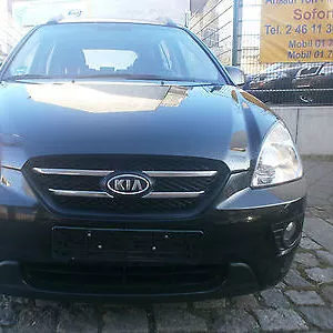 Kia Carens III капот бампер фари двері крила скло