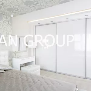 Компания Ocean Group изготавливает шкафы купе и гардеробные комнаты